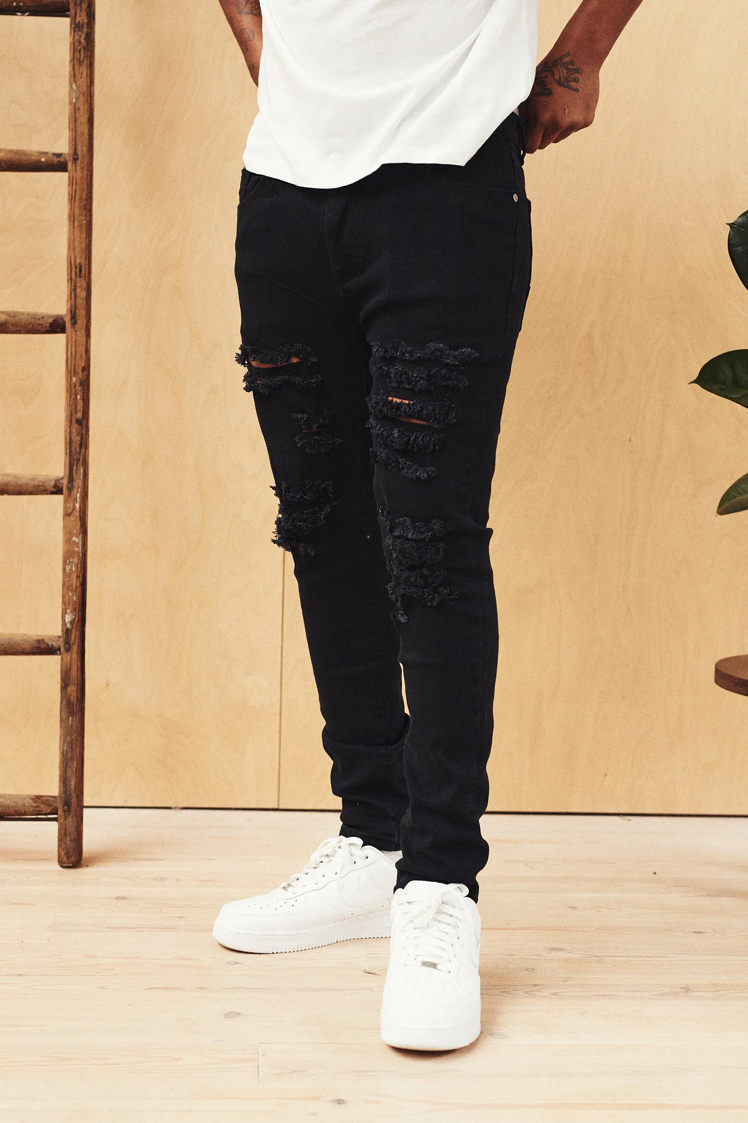 Logan Stretch Skinny Fit Jeans With Rips In Black