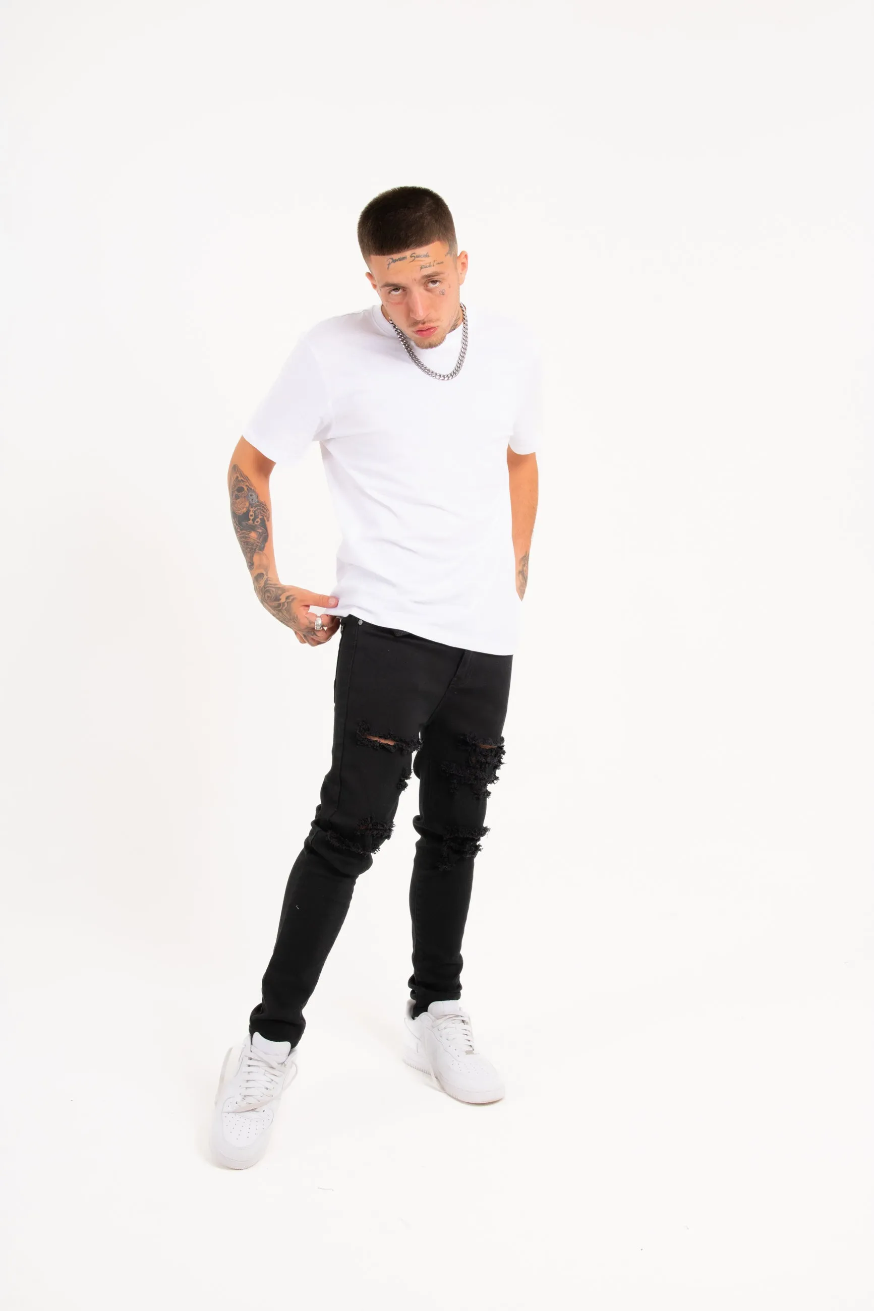 Logan Stretch Skinny Fit Jeans With Rips In Black